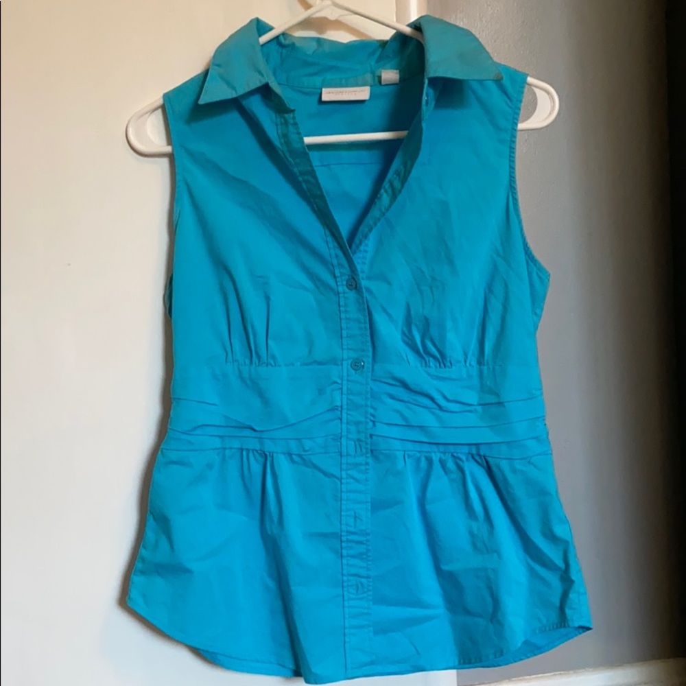 Blue sleeveless button down dress shirt